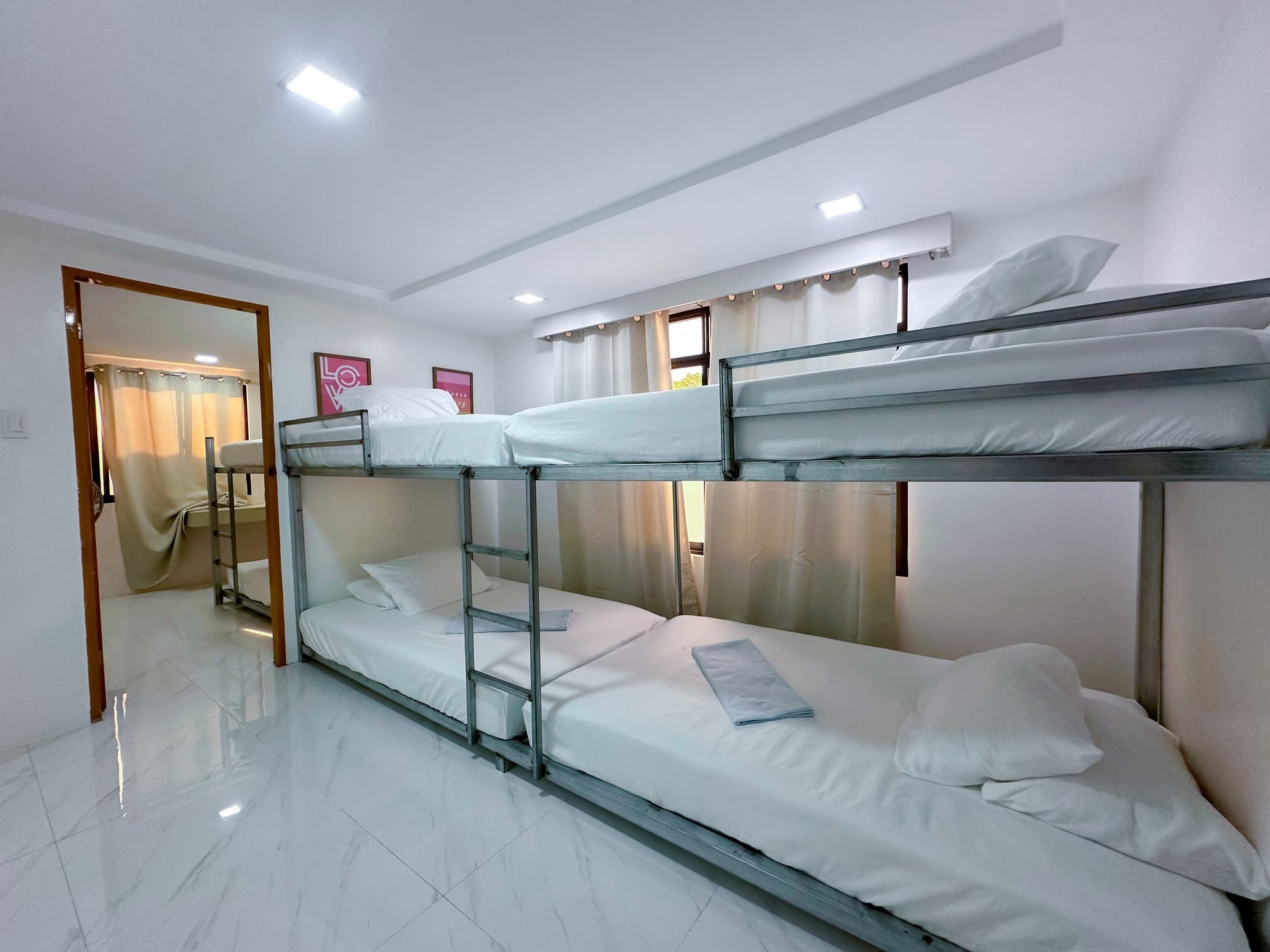Air-conditioned group sleeping room with bunk beds at The Resthouse
